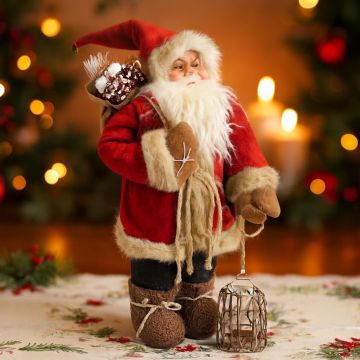 Red Santa Claus with wooden basket and hessian sack